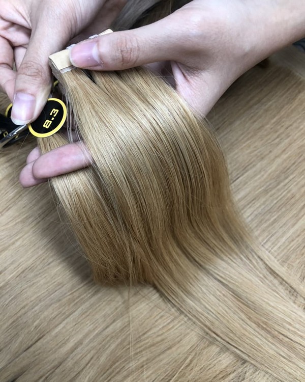 Virgin brazilian tape in hair extension