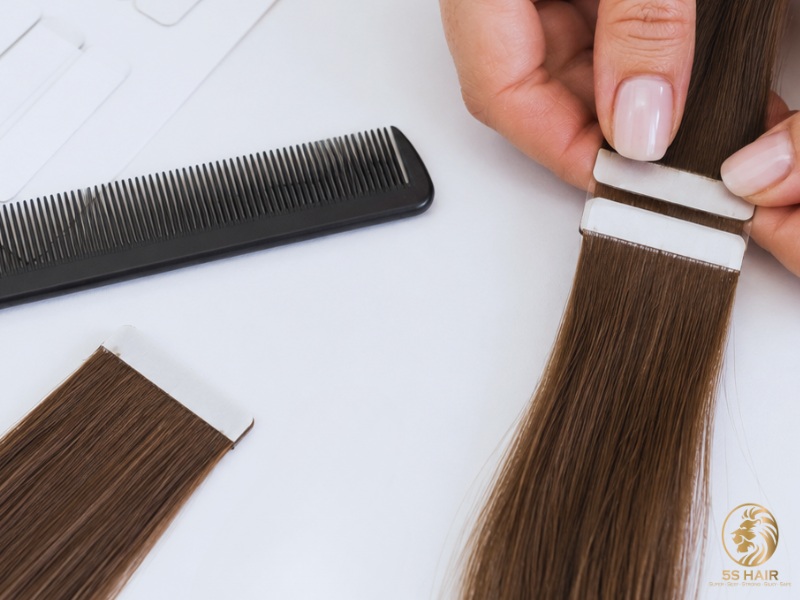 Apply pre-cut replacement tape to each clean, dry weft and reinstall the extensions.